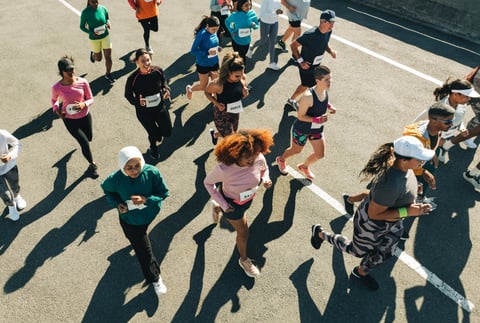 Group of people running in organized outdoor race