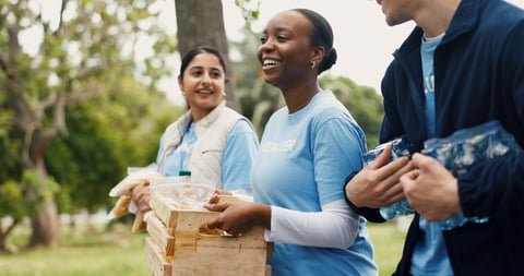 Community outreach volunteers helping people outdoors