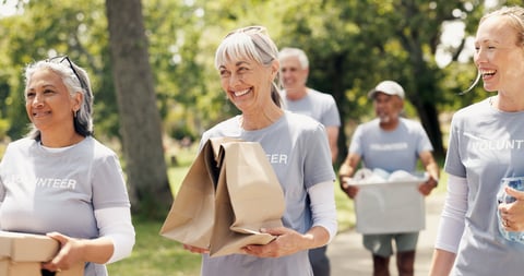 Volunteer team helping community outdoors
